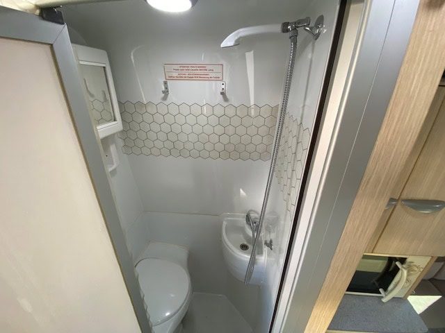 Three berth motorhome bathroom with shower and toilet
