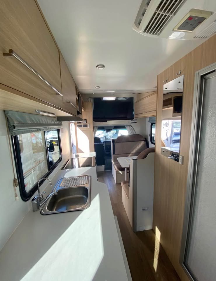 Six berth motorhome looking through to the cab